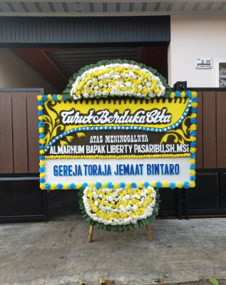 Papan Bunga Duka di Munte